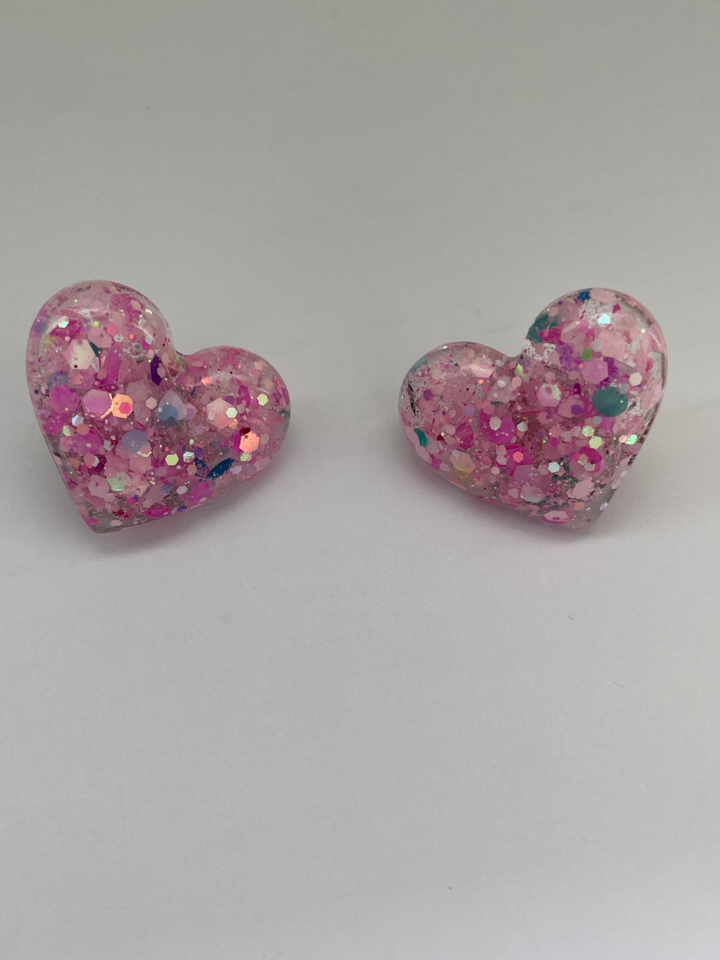 Petite broche cœur rose à paillettes