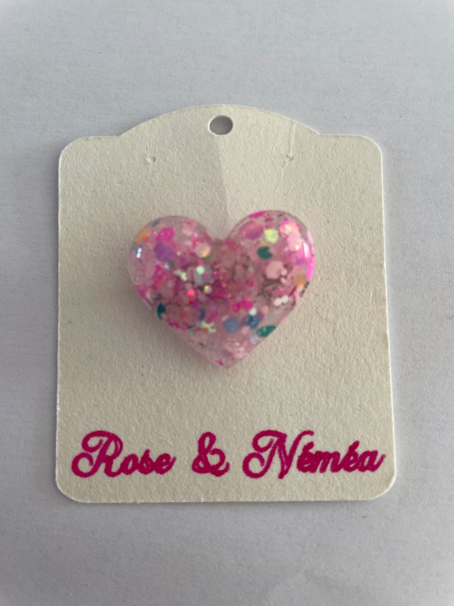 Petite broche cœur rose à paillettes